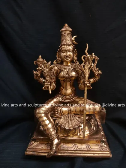 A 10-inch bronze sculpture of Lalitha Tripura Sundari, the "beautiful goddess of the three worlds." This small icon, shipped to the USA, captures her playful and benevolent nature.