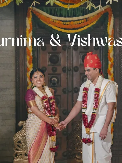 A traditionally rooted South Indian wedding, capturing the couple holding hands in a moment of love and happiness. I plan weddings that are rich in culture and emotion.