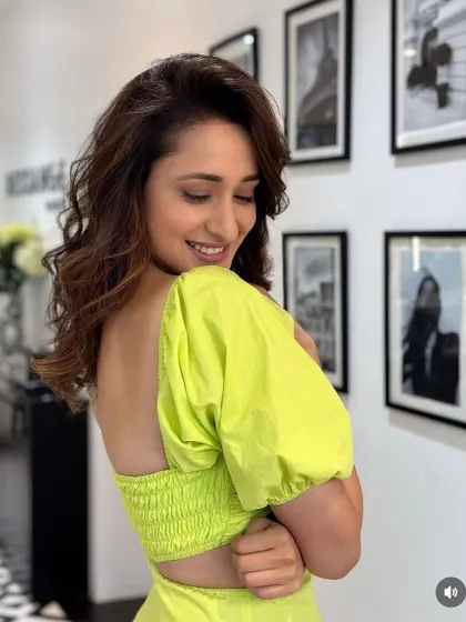 A side profile of Pragya Jaiswal's new haircut, showing off the beautiful, soft layers and healthy shine of her hair.