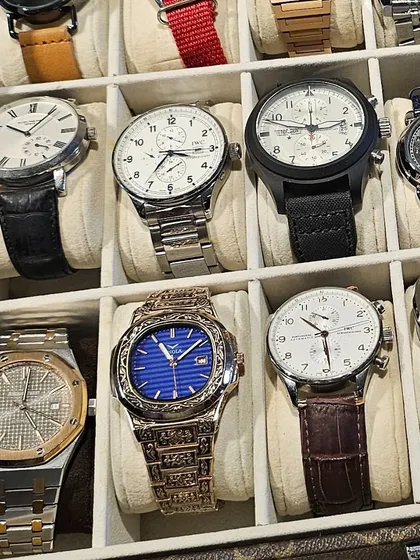A gift of organized space is perfect for the important men in your life. Here, a collection of luxury watches is beautifully arranged in a compartmentalized tray, protecting them and making them easy to access.