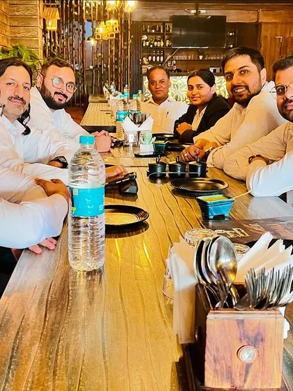 A team lunch to celebrate a birthday. Taking time to connect outside the courtroom is important for our team's morale and unity.