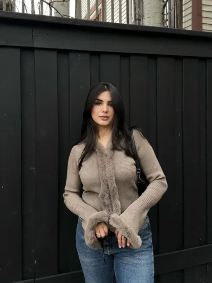 A full-frontal view of the Shein cardigan paired with classic blue jeans.