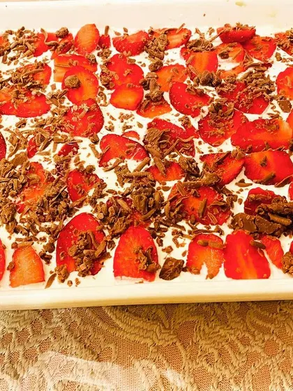 Celebrating the season with my special Strawberry Banoffee Pie. It's a delicious twist on the classic, topped with fresh strawberries and chocolate shavings.