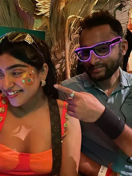 A fun, colorful glitter design with orange and turquoise accents. This look is all about playful energy and good vibes.