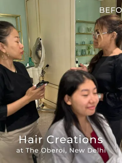 The consultation process is key. Here, our stylists discuss the client's vision before beginning a cut and colour transformation.