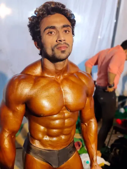 How old is this photo? A throwback to my earlier days in bodybuilding, showing the foundation I built.