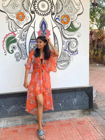 Finding art and color in the streets of Varkala. This beautiful elephant mural was the perfect backdrop for my flowy orange shrug.