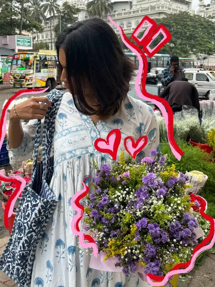 A candid shot from a flower market run, with a doodled frame and hearts.