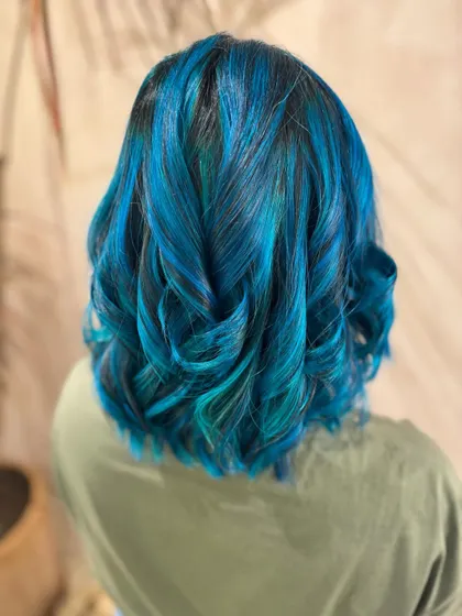 Embracing the inner mermaid with this stunning blue hair. This is a bleach color, perfect for a bold, fantasy look. (No filter)