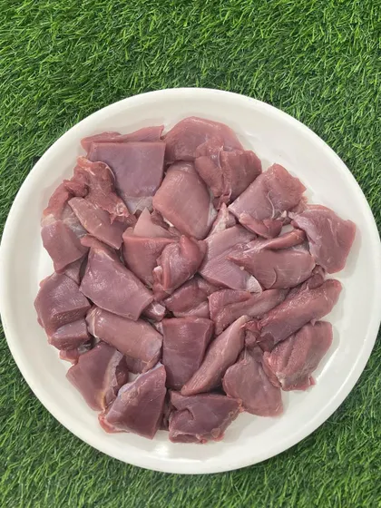 Our Turkey Boneless meat, plated to show its rich color and texture. It's a high-quality protein sourced from healthy, locally-raised birds.