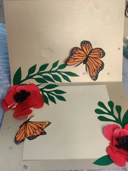 The inside of the handmade greeting card, showing more decorative elements and space for a personal message.