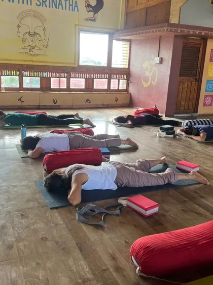 The end of a Yin class, with students in deep relaxation, allowing the benefits of the practice to integrate.