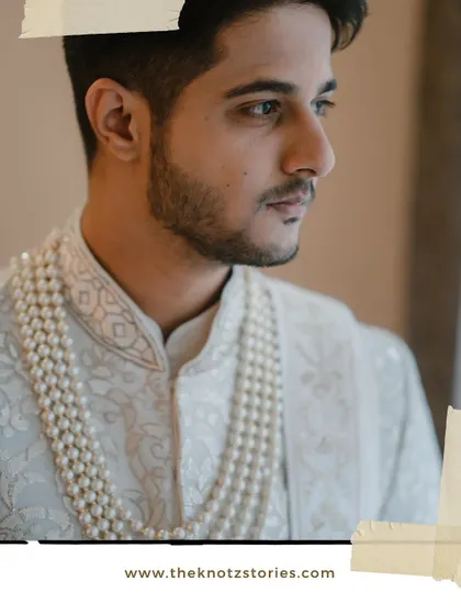 A duplicate of 305, showcasing the groom's classic and elegant look.