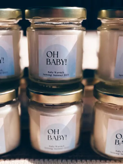 A simple and modern "Oh Baby!" announcement candle. These are a great way to share your exciting news with family and friends, and they are available for under 99 rupees.