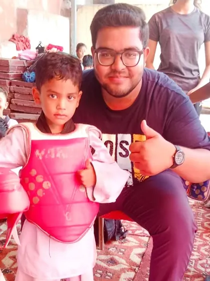The journey to becoming a conqueror starts young. A moment with one of our little champs, ready for his first fight.