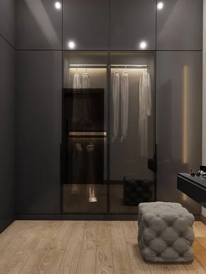 A 3D render of a walk-in closet and dressing area, featuring smoked glass wardrobes and a floating vanity for a sleek, modern feel.