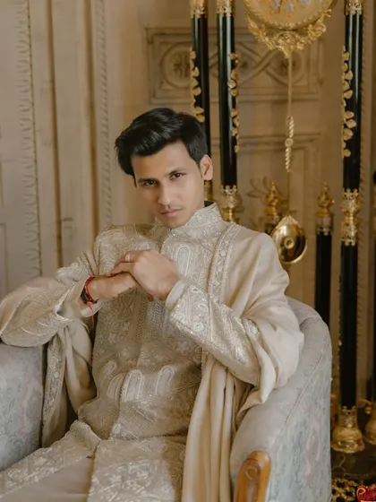 A direct, confident gaze from the king. I ensure my grooms feel as special and celebrated as the brides with their own set of stunning portraits.