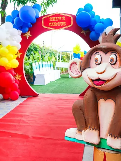 Another angle of the fun circus entrance, showing the path leading into the main party area.