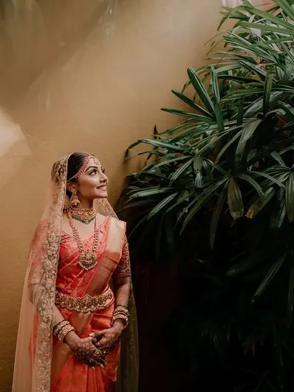 A beautiful, candid moment between the bride and groom. We use natural surroundings and soft light to create portraits that feel both intimate and timeless.