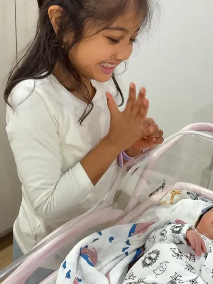 The pure joy on my daughter's face as she meets her baby brother for the first time. Preparing her to be a big sister was so important, and this moment made it all worth it.