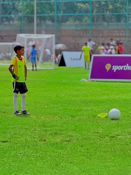 Players setting up for a free-kick. We teach our teams various set-piece strategies.