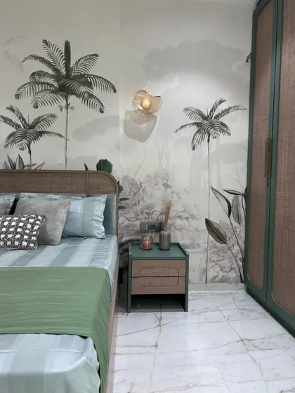 A closer look at the details in this nature-themed bedroom. The marble flooring provides a cool, elegant base that contrasts beautifully with the warm, earthy tones of the wardrobe and bedside table.