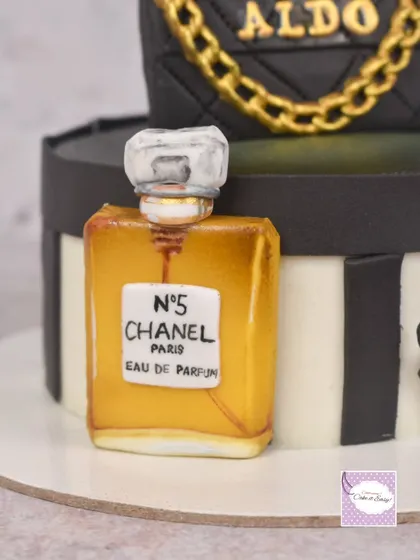 A detailed shot of the perfume bottle topper.