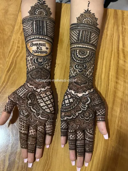 A full view of the intricate Indian mehendi for the sister-in-law.
