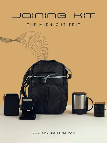 The Midnight Edit joining kit is perfect for the modern professional. This all black set includes a travel bag, a phone stand, a stainless steel mug, and a universal adapter.