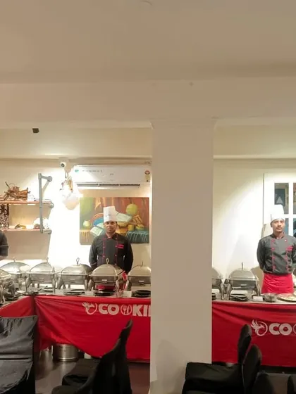 Our catering setup for a corporate team event at Breakout Escape Room, showing we can provide great food in unconventional venues.