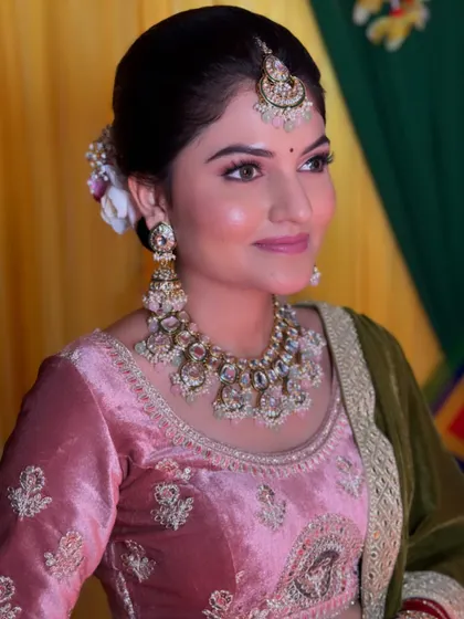 Raman Preet looking absolutely stunning for her wedding. The soft pink makeup and glowing skin perfectly matched her velvet lehenga.