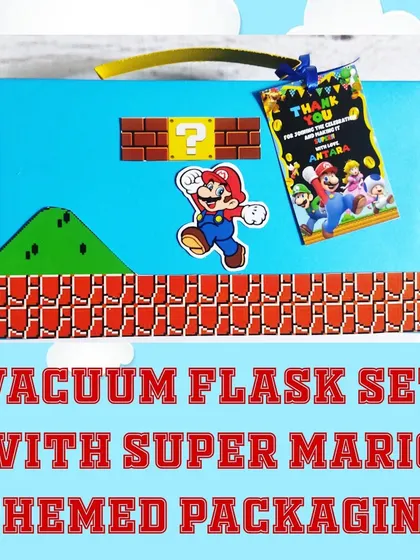 A close-up of the Super Mario themed gift box, which is designed to look like a level from the game.