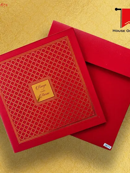 A vibrant red invitation with a gold foil pattern. This luxurious card is perfect for a grand and traditional Indian wedding.