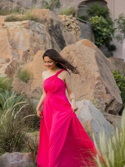 A beautiful solo shot of the bride-to-be during her pre-wedding shoot. The minimal makeup and flowing dress create a look of effortless romance.