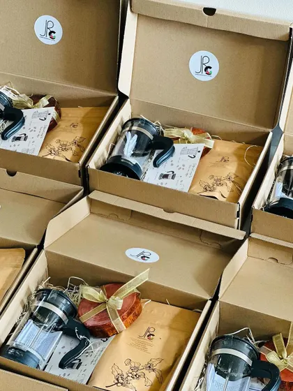 Rows of our popular corporate coffee kits, a testament to their appeal as a modern and practical gift.