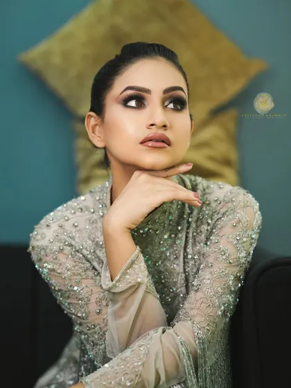 Another beautiful angle of the silver-grey gown, showcasing its luxurious texture and sophisticated design.