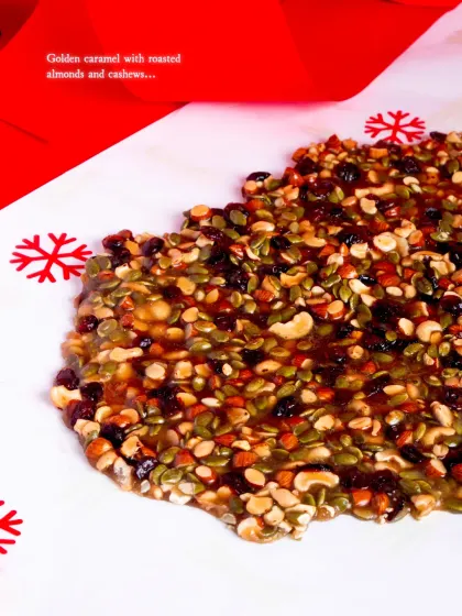 The base of the brittle is a golden caramel with roasted almonds and cashews.