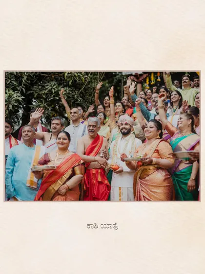 The Kashi Yatra, a moment of celebration with the entire family cheering on the groom. The energy is captured perfectly in this wide shot.