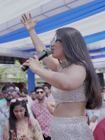 Getting the party started at a beautiful destination wedding in Goa. As a host, I bring my energy right into the crowd, ensuring every guest feels like a part of the celebration.