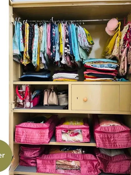 After organizing, every item has a home. Clothes are neatly hung, folded items are stacked, and bags are stored in matching organizers, creating a visually pleasing and practical wardrobe.