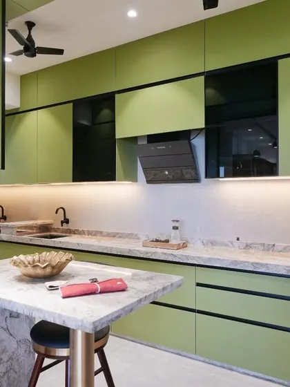 A closer look at the breakfast bar, featuring a beautiful marble top and elegant pendant lighting. This small detail creates a perfect spot for a quick meal or morning coffee.