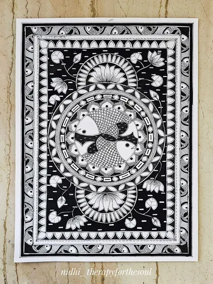 The complete 'Madhubani Machali' artwork on A4 paper before framing. I revisited this piece to add more ink and detail, which really brought the intricate black and white composition together.