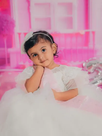 That sweet, thoughtful pose is just too cute. This little Barbie is a natural in front of the camera.