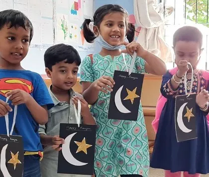 Children proudly display the lanterns they made to celebrate Ramadan. We learn about the importance of sharing and giving, and we create art that reflects the symbols of the festival.