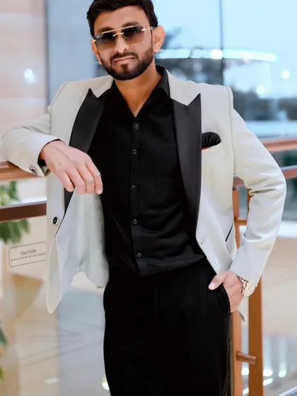 A full-length view of my formal attire. I believe an anchor's presentation is a crucial part of the overall event experience, and I always dress to impress.