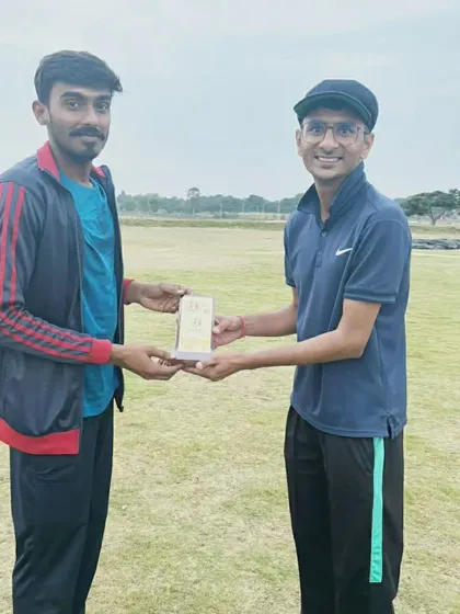 A player receiving an award, a common sight at our academy where effort is always recognized.