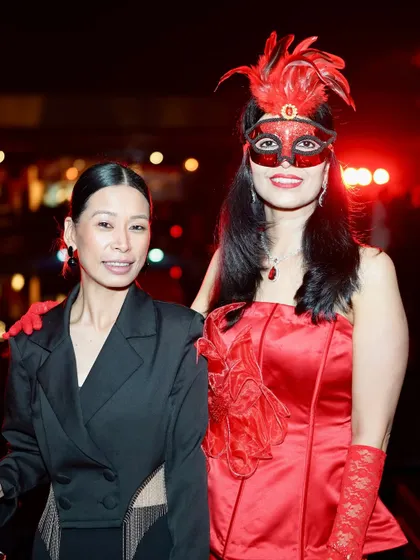 Another couple in masquerade, embracing the elegant and mysterious side of Halloween.