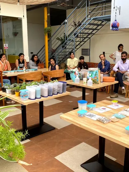 A snapshot of me explaining the basics of terrarium building at the start of a workshop. I cover everything from layering materials to plant care, ensuring everyone feels confident.