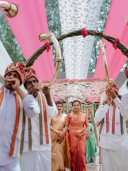 The groom's grand entrance, heralded by traditional musicians. We capture the pomp and ceremony that makes for an unforgettable start to the wedding.