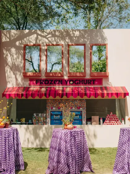 A whimsical "Saturday Market" themed event in Udaipur, with custom-designed stalls for a Chai House, Frozen Yoghurt, and Ice Gola, complete with unique branding and playful decor.